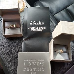 An engagement ring and man's wedding band .